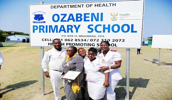 School Health team celebrating achievement of health promoting school